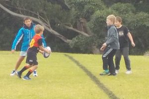 Just like an Aussie the little man got right into the mix of some rugby union action